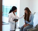 doctor comforts patient